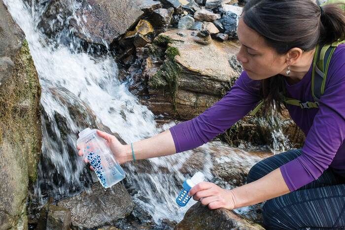 Woman Filling BeFree At Waterfall 1 1